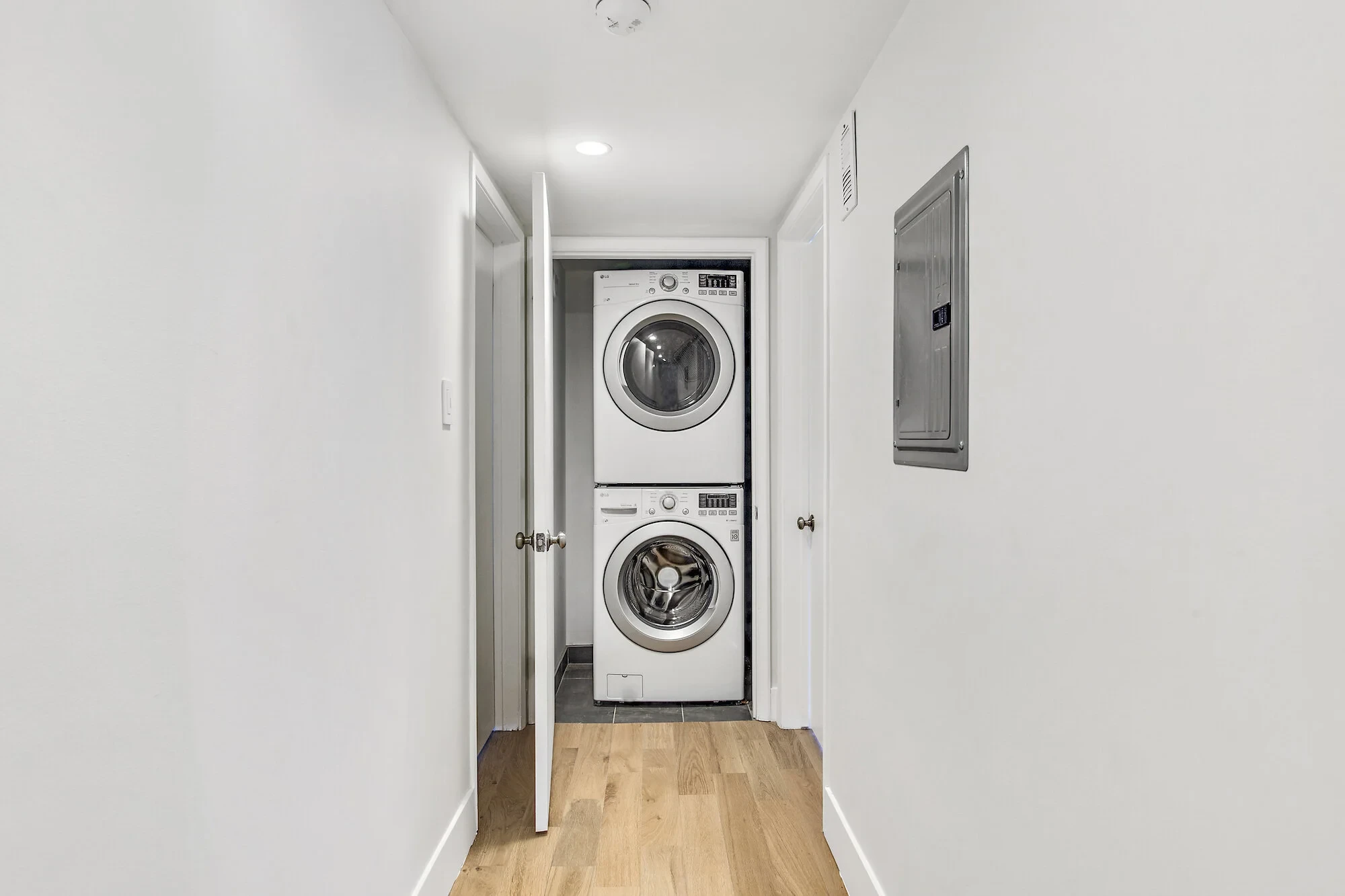 In-unit laundry with stacked washer and dryer