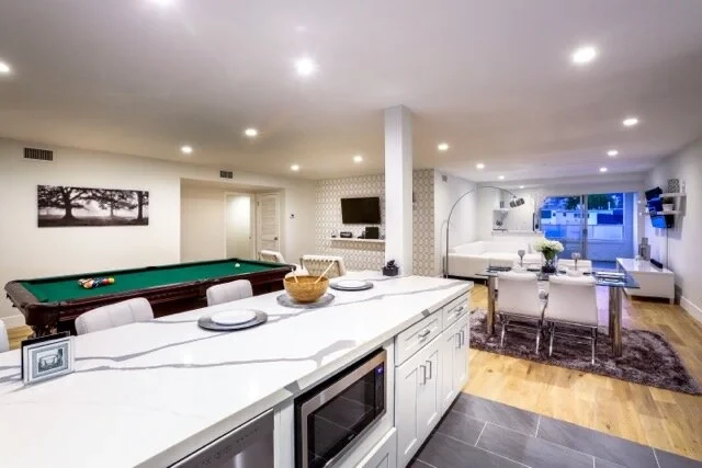 Panoramic view of open-concept living and recreation room
